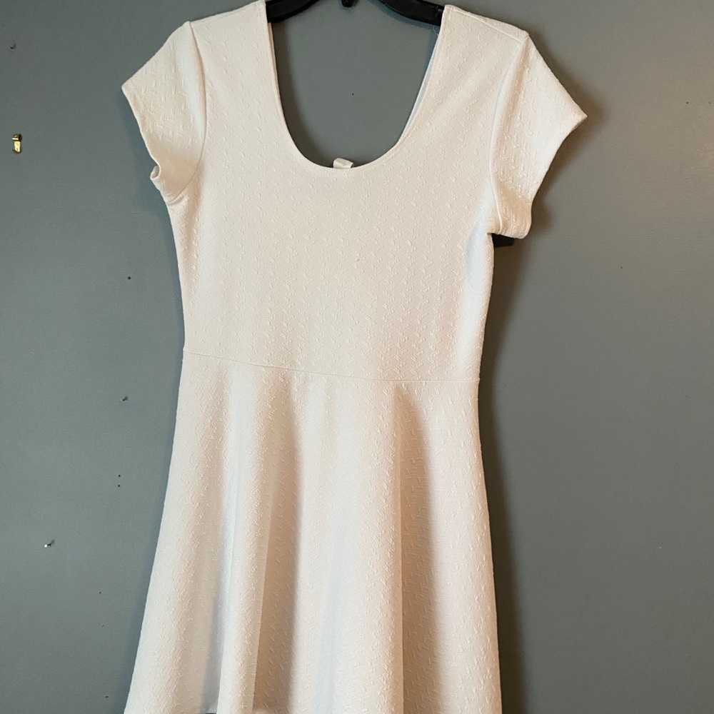 White fitted dress.